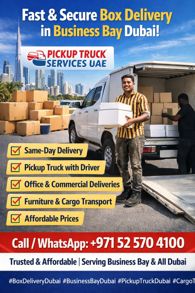 Sharjah Movers and Packers team loading boxes into a truck for villa relocation