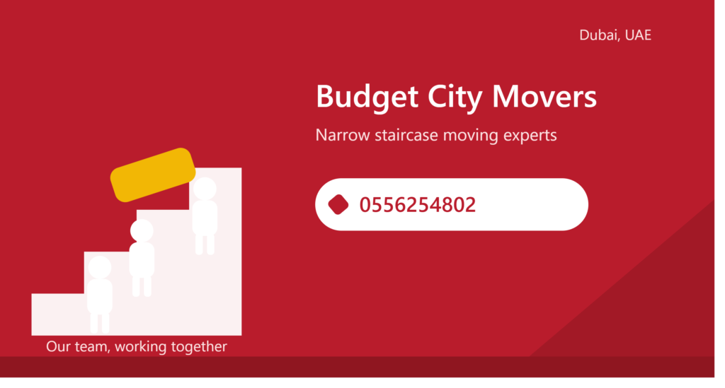 Budget City Movers team carrying a sofa up a narrow staircase in Dubai — call 0556254802 for staircase moving experts